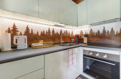 Schignano Ski Chalet | Chalet 'Nini's Home' with Private Terrace, Private Garden and Wi-Fi