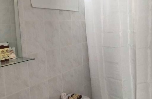 Ponce Centro Apartment | Chandelier 302