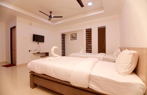 Kollam Hotel | Chandra Inn