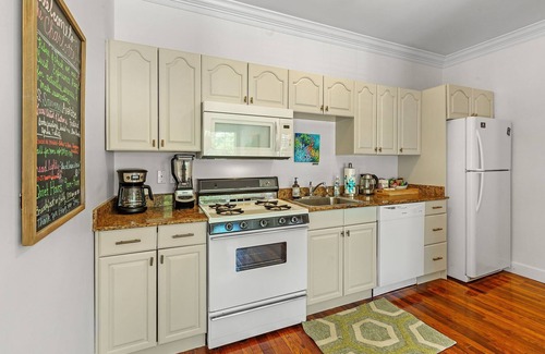 Fairhope Apartment | Charlotte at Jubilee Suites Bed & Breakfast. 1K/1B