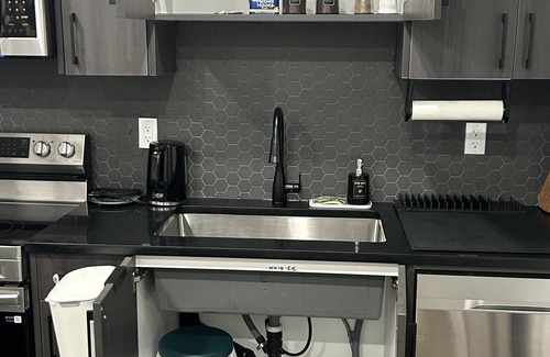 Calgary House | Charming 1-Bedroom Basement Walkout Suite with a Gym and Office.