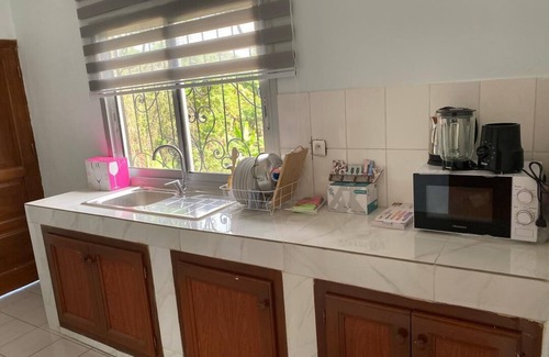 Yaounde House | Charming 2-bedroom apartment with WiFi, AC, Garden in Odza Borne 12, Yaounde