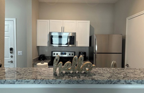 Legacy Park Apartment | Charming 2-bedroom apartment with WiFi, in the shops of legacy east
