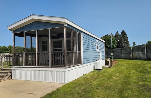 Silver Lake RV Rental | Charming 2-bedroom cabin at Sun Retreats Silver Lake campground.