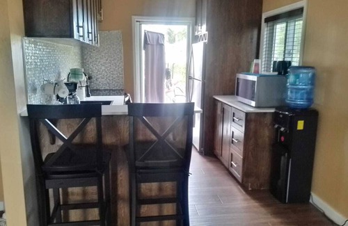Tar Bay Cottage | Charming 2-bedroom cottage with AC, WiFi, . Two-minute walk to beach.