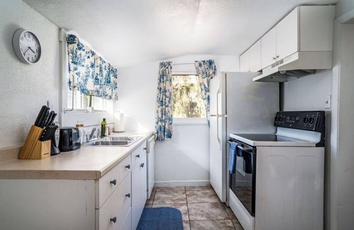 Walker's Island House | Charming 2-bedroom house with huge yard and firepit in Eagle Lake