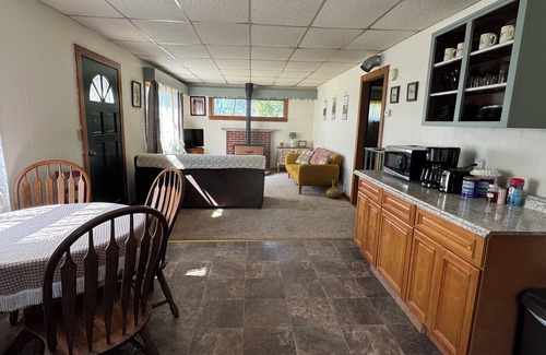 Irvine House | Charming 2-bedroom house in Tiona with sunset views and everything you need.