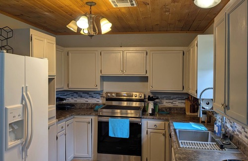 Okmulgee House | Charming 2-bedroom lake house with boat dock in tranquil setting in Okmulgee