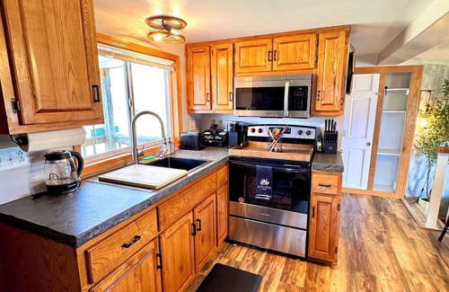 Oconto Cabin | Charming 2-bedroom Oconto Waterfront Cabin! Pier, Free Kayaks! Dogs welcome!