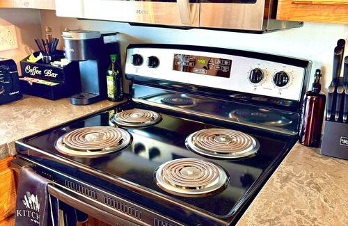Oconto Cabin | Charming 2-bedroom Oconto Waterfront Cabin! Pier, Free Kayaks! Dogs welcome!