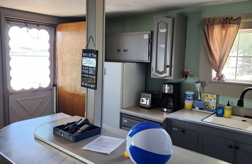 Bellevue Cabin | Charming 2 bedroom waterfront cabin at West Magic Id. 83352 with hot tub.