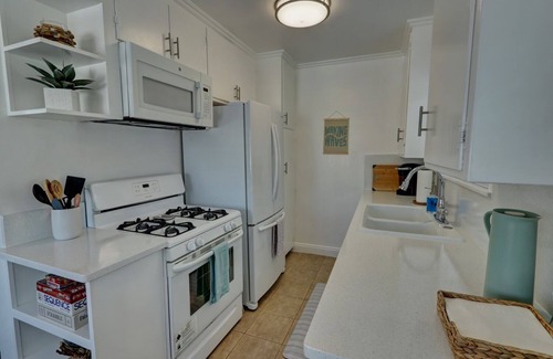 West Newport Apartment | Charming 2BR w/Balcony, BBQ & Outdoor Dining