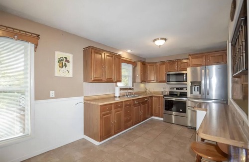 Topeka House | Charming 3-bedroom bungalow with fitness room, WiFi in soothing Topeka
