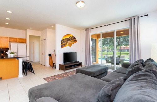 Seasons Villa | Charming 4-bedroom villa with AC, fitness room, WiFi in Kissimmee