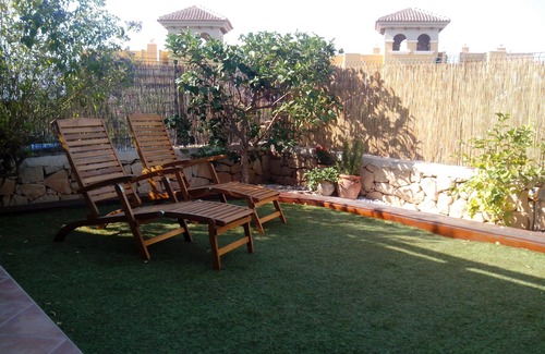 Los Puertos Apartment | Charming and spacious ground floor apartment with own gardens and shared pool
