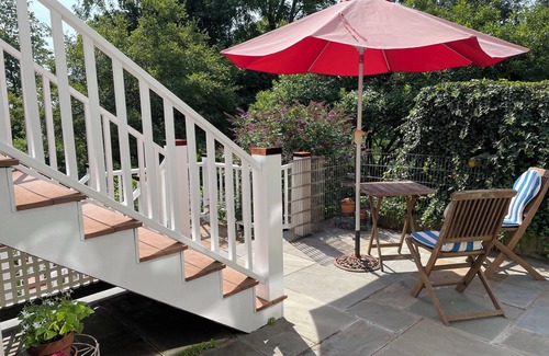 West Mystic Apartment | Charming apartment overlooking private gardens, walk to downtown Mystic