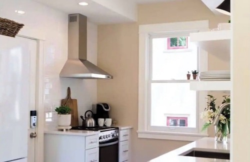 Linden Hills House | Charming Boxwood Cottage in Linden Hills