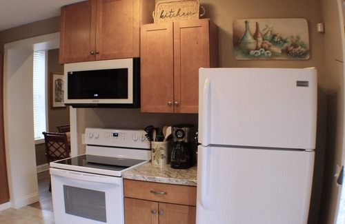 Winona House | Charming Brick Farmhouse with a Touch of Elegance. -Winona