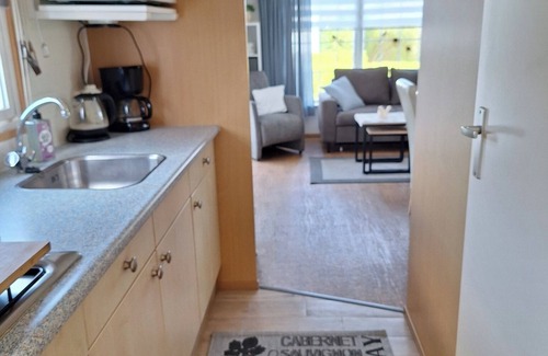 Baarland Ski Chalet | Charming chalet on camping Scheldeoord, 5 min walk from the Westerschelde