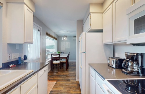 Suquamish Condo | Charming condo with bay views, 2 kayaks, free WiFi & steps from the waterfront