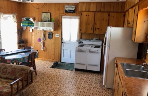 Westmore Cabin | Charming cottage on Lake Willoughby w/sun porch, private deck and dock.