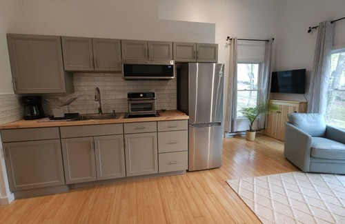 Woodstock Cottage | Charming Cottage Rental Near Woodstock Heated Pool, Fire Pit, Screened Porch