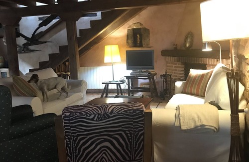 Brieva Cottage | Charming cottage with fireplace perfect for relaxing with family or friends.