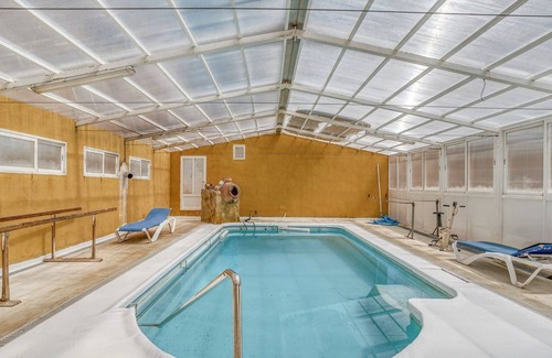 Oria House | Charming house in El Campillo with shared heated swimming pool