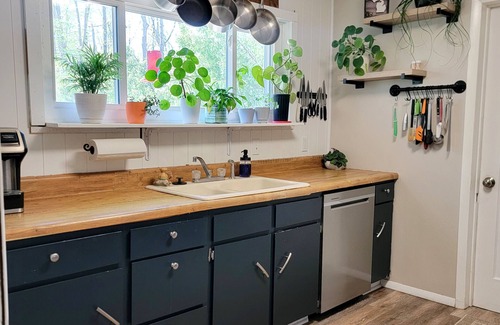 Harbor Springs Cottage | Charming garden cottage on the bike path with Scenic backyard in Harbor Springs