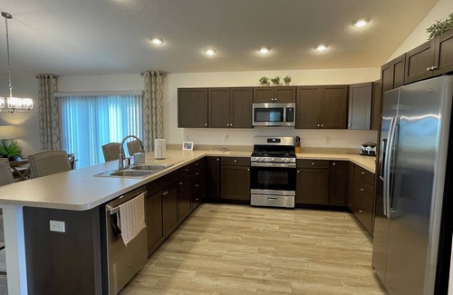 Okahumpka House | Charming home w/spacious kitchen, water view, enclosed lanai, & Pet Friendly