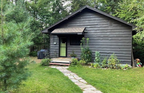 Dwight Cottage | Charming lakefront cottage with private dock, stunning sunsets & cozy wood stove