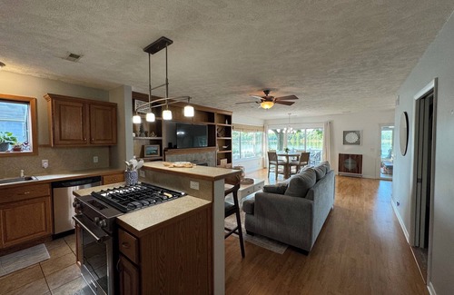 Gobles House | Charming Lakefront House with Hot Tub, Fire Pit, Kayak, and Fishing