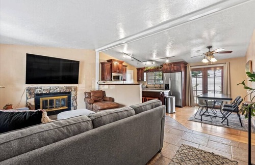 Millcreek House | Charming Mountain Retreat with Enclosed Backyard and Artistic Flair