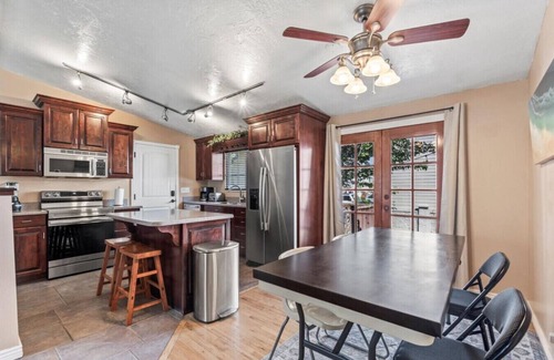 Millcreek House | Charming Mountain Retreat with Enclosed Backyard and Artistic Flair