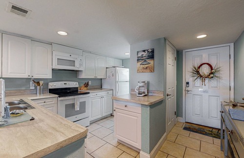 Point East Condo | Charming oceanview condo just steps from the beach