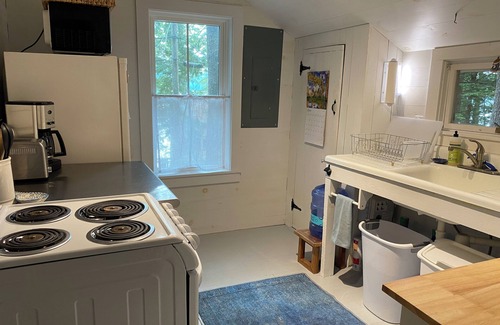 Readfield House | Charming, peaceful Maranacook waterfront camp nestled in the pines