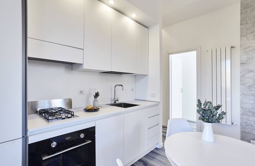 Quartiere XXXIII Lido di Ostia Ponente Apartment | Charming penthouse with an ocean view a few steps from the train and bus station