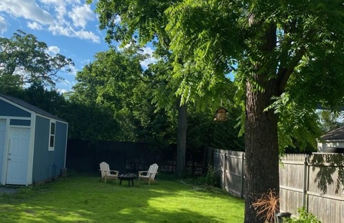 Riverhead House | Charming Riverhead home with large outdoor patio & backyard firepit