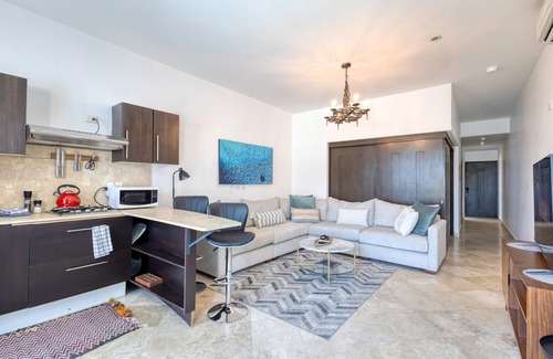 Libertad Apartment | Charming & sunlit condo with pool & balcony - near golf, beaches, & nightlife