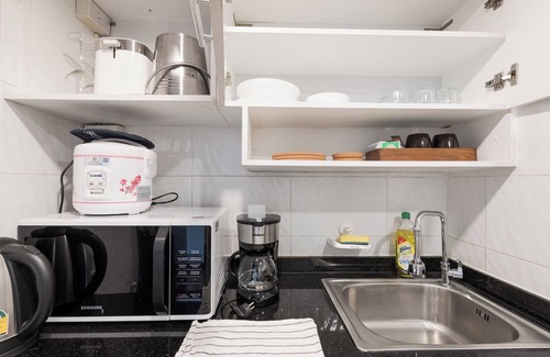 Nana Apartment | Charming 1BR suite near malls, parks, and metro in vibrant Bangkok