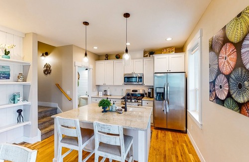 Olivia Beach House | Charming, three-story getaway w/two cozy living areas - walk to the beach