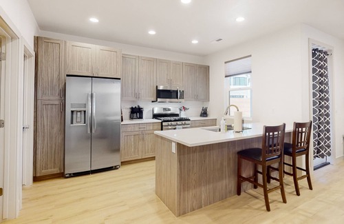 Santa Clara House | Charming townhouse with mountain view, heated pool, central AC, & W/D