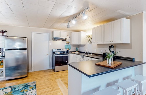 Colchester House | Charming two-story duplex with a full kitchen & grassy yard - near Mallets Bay
