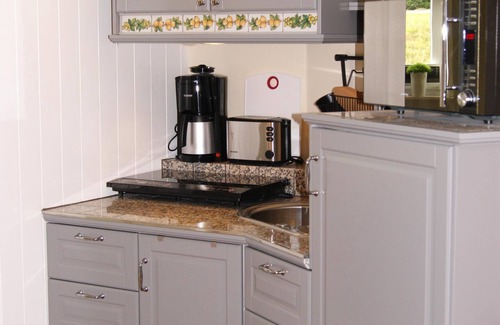 Galmsbull Apartment | Cheese room - thatched roof house, garden, sauna, close to the beach