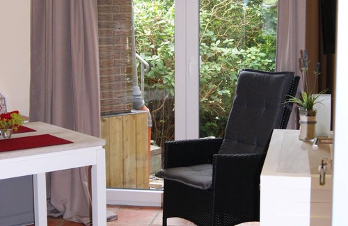 Galmsbull Apartment | Cheese room - thatched roof house, garden, sauna, close to the beach