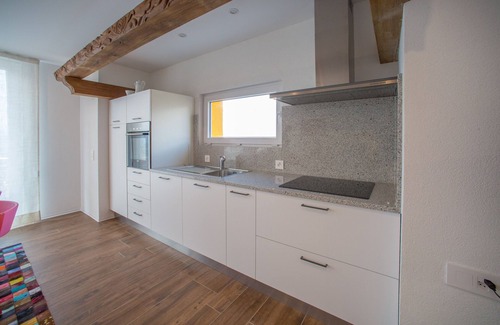 Giubiasco Apartment | Cherry tree apartments surrounded by greenery