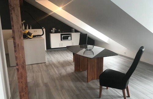 Furstenfeldbruck District Apartment | Chic attic apartment with full furnishings and parking space on the outskirts of Munich