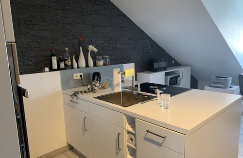 Furstenfeldbruck District Apartment | Chic attic apartment with full furnishings and parking space on the outskirts of Munich