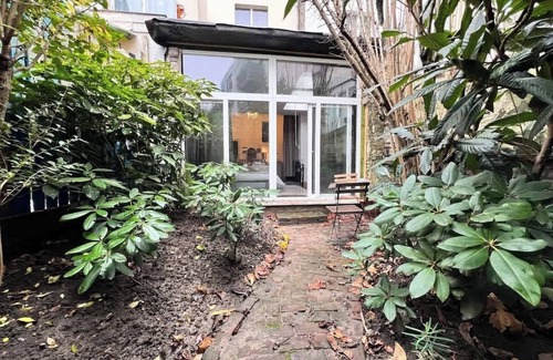Saint-Josse-ten-Noode Apartment | Chic Comfortable Loft with Patio and Natural Light