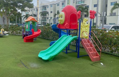 Llanos de Gurabo I Apartment | Chic Urban Retreat Pool Gym Free Parking Playground